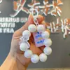 Suprimento de Caixa Surpresa ao Vivo Chaveiro Acrílico Pingente Pequeno Caractere Chinês Laço Casal Homens e Mulheres Corrente de Celular com Contas