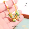 Tienda de oro con fuerte retención de color, colgante de mariposa con flores azules ardientes de oro arena de Vietnam, accesorios de bricolaje, collar, cadena de suéter
