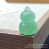 Sello de Calabaza Fermentada Flor de Durazno de Jade Seda Dorada de Xinjiang Colgante de Calabaza Tridimensional de Jade Colgante de Jade Recuerdo