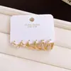 Aros Redondos para Oreja Bañados en Oro Real de 14K con Forma de Uña de Circonita Simple Pendientes Versátiles de Nicho Pendientes de Lujo Ligero de Alta Gama para Mujeres