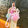 Llavero creativo de pata de gato para presionar y jugar, juguete de botón para aliviar el estrés, juguete para estudiantes, colgante para bolsa, premio de máquina de garra, pequeños regalos al por mayor