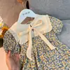 Verano 2024 nuevo vestido de princesa floral con solapa estilo coreano para niñas, vestido de verano de manga corta para niños y bebés