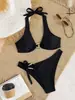 Comercio Electrónico Transfronterizo Se Especializa en Suministrar Lotes Directos de Fábrica en Stock de Bikinis de Color Sólido Divididos Populares Europeos y Americanos Accesorios Sexy