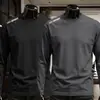 Camiseta fina de manga comprida para outono para homens, cor sólida, elástica, secagem rápida, caimento solto, casual moderno, gola redonda, segunda pele