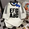 Camiseta Popular Americana Estampada com Letras e Três Listras de Manga Curta para Homens e Mulheres, Estilo Solto Chique de Verão 2025