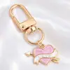 Colgantes de dibujos animados rosas lindos estilo coreano, dijes de aleación de esmalte de conejo y estrella, llaveros con anilla en D, accesorios para manualidades, venta al por mayor