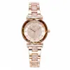 Nuevo reloj de cuarzo para mujer Gedi con esfera romana estrellada, acentos de diamantes completos, correa de acero, resistente al agua, elegante y versátil para el trabajo diario y los desplazamientos.