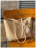 Bolso tote para mujer, nuevo modelo transfronterizo, bolso de hombro suave vintage de alta gama, bolso de mano grande para ir al trabajo con asa texturizada