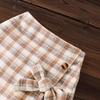 24 Traje de falda a cuadros con lazo y top de manga larga para niñas transfronterizas de otoño e invierno de moda europea y americana para niñas