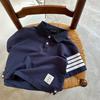 Camisa Polo Versátil Infantil Verão 2025 Novo Estilo para Meninos e Meninas Camiseta Simples com Estampa e Gola Camisa Bebê Marca Tendência Camiseta de Manga Curta