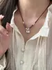 Collar de Bolsa de la Suerte Pequeña y Gordita Pacífica para Mujer 2025 Nuevo Estilo Chino Cuerda Roja Trenzada Candado Ruyi Cadena para Clavícula Verano