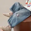 Jeans bordados de gato de otoño nuevos transfronterizos para niños 2026 versión coreana pantalones de pierna ancha escolares para niñas moda infantil
