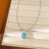 Collar de flor redonda de circón azul, cadena para la clavícula de nicho de lujo ligero, juego de joyería de alta gama, fresco y elegante