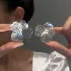 Aretes de flor hueca de alta gama exagerados aretes grandes aguja de plata 2024 nuevos aretes de moda alta gama explosiones mujeres