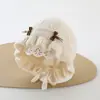 Nuevo gorro para bebé para otoño e invierno, gorro de punto con encaje de princesa para proteger las orejas, elegante y dulce para niñas y bebés
