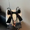 Moda de Verano Transfronteriza 2025 Estilo Nuevo Hermoso Lazo Gran Capacidad Bolso de Mano para Mujer Bolso Tote Bolso de Hombro para Axila