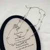 Collar Minimalista de Estrella de Cinco Puntas Largo Doble Capa con un Estilo Único y Discreto, Temperamento de Nicho, Accesorio de Cadena de Collar de Suéter de Gama Alta