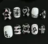 Uñas vestibles de Halloween superventas transfronterizas europeas y americanas, piezas de arte de uñas de calabaza, calavera y fantasma puramente hechas a mano, productos terminados para venta al por mayor de alta gama
