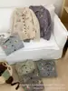 Cardigan de solapa bordado floral de estilo suave para mujer, chaqueta de punto suave versátil para otoño e invierno con mangas largas