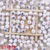 Cuentas de cerámica de porcelana azul y blanca pintadas a mano cuerda roja collar tejido a mano pulsera accesorios DIY cuentas sueltas accesorios de joyería