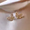 Pendientes de botón de mariposa con circonita Micro-set para el día a día Pendientes de nicho de lujo ligero europeos y americanos Adornos para las orejas exquisitos, elegantes y de alta gama para mujer
