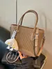 Bolso de mujer de nicho de alta gama transfronterizo 2026 nueva moda versión coreana bolso cruzado, bolso cubo de mano simple súper popular