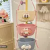En stock canasta de almacenamiento tejida con cuerda de algodón decoración caricatura Sanrio canasta colgante de tres niveles cosméticos artículos varios canasta de pared