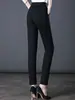 Leggings cortos 7003 para mamás Primavera Nuevo 2023 Primavera y Otoño talla grande pantalones de mujer de mediana edad ajustados tipo lápiz 9 puntos