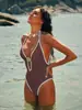 Traje de baño enterizo sexy ajustado para mujer Xingcheng de comercio exterior transfronterizo Amazon 2025 de nailon con escote en V profundo