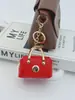 Colgante Llavero Mini Bolso de Cuero, Accesorio de Moda de Alta Gama para Bolso, Accesorio Creativo para Niñas, Puede Guardar Auriculares