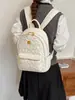 Nueva mochila con relieve en forma de corazón transfronteriza para estudiantes, bolsa ligera para viajes diarios, mochila pequeña de nicho de lujo ligero
