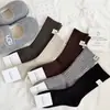Accesorios de Invierno Estilo Nuevo Calcetines Largos Holgados de Cachemir de Doble Punto para Mujer Calcetines Largos Cálidos de Estilo Coreano Modernos con Etiquetas de Tela para Mujer