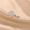 Anillo Giratorio de Cuatro Hojas Anti-Ansiedad de Moda Europea y Americana Transfronterizo para Mujer, Joyería Versátil de Circonita Ajustable