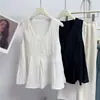 Camiseta de color liso transpirable sin mangas con cuello en V y dobladillo en línea A para mujer, top tipo tank top babydoll elegante de verano 2026 para mujer