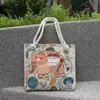 Nuevo Paño de Arena Bolsa de Flores de Seda Dorada Bolso de Hombro Bolso Tote de Gran Capacidad Bolsa de Lona Estilo Nacional Peonía Bolsa de Compras Portátil