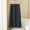 Elegante falda de lana con lunares negros para mujer, nuevo modelo otoño e invierno 2026, de cintura alta, adelgazante, con abertura, de longitud media, falda ajustada