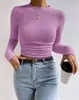 Camiseta feminina de manga comprida com estampa xadrez, gola redonda, caimento slim, versátil, com detalhes franzidos, para outono/inverno, cruzada na Amazon europeia e americana