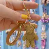 Net vermelho diamante violento urso carro controle remoto corrente anel cordão chaveiro pingente personalidade casal saco pendurado atacado