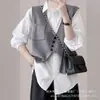 Chaleco de punto irregular de diseño de nicho estilo coreano con bolsillos, cárdigan corto exterior de cuello en V a la moda para mujer