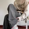 Pantalones casuales de moda retro de calle estilo americano con una variedad de elementos de diseño, corte holgado, tejido, pierna recta, lavado y favorecedores para la figura