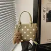 Moda fuente de fábrica transfronteriza 2026 nuevo diseño de lunares en nailon bolso de mano casual para el día a día bolso de hombro tipo cubo