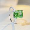 Anillo de plata de ley 925 con circonitas talladas en flor de hielo y diamantes de alto carbono de Nine Beauty Jewelry, color esmeralda, estilo europeo y americano.