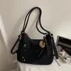 Bolsa de Ombro Nova Estilo Primavera 2026 Retrô Fashionável e Elegante de Aparência Sofisticada para Trabalhadores de Escritório no Trajeto Bolsa Tote Retrô