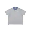 Camiseta de Manga Corta a Cuadros Contrastantes Estilo Coreano Patchwork para Hombre Verano 2025 Nuevo Retro Holgada Aspecto Adelgazante Top con Cuello Polo