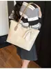 Bolso tote de gran capacidad para commuting para comercio exterior, nuevo bolso de hombro vintage 2026, versátil, simple, bolso de hombro y bandolera de alta gama