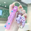 Nuevo Estilo Taza de Té de Leche Llavero Relleno de Aceite Color Macarrón Correa de Muñeca de Goma Suave Llavero de Coche Colgante para Mochila Femenina