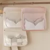 Bolsa colgante de almacenamiento de ropa interior para el hogar más vendida transfronteriza para dormitorio de estudiante, detrás de la puerta, armario, bolsa de almacenamiento montada en la pared para ropa interior y calcetines