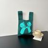 Bolsa Tricotada com Senso Avançado Nova Bolsa de Pulso de Desenho Animado Bolsa de Férias Bolsa de Mão Nicho Versátil Bolsa de Mão Bolsa de Presente