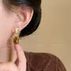Brincos Retrô Maillard Caramelo Pedra Olho de Tigre Femininos Outono e Inverno Luxo Leve Nicho High-End Brincos Únicos e Bonitos