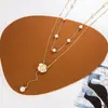 Nuevo Collar de Perlas Camelia con Borlas, Cadena Doble Capa para Clavícula para Mujer, Diseño de Alta Gama, Joyería de Estilo Nicho